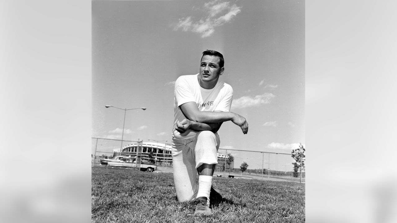 Washington Redskins defensive captain Sam Huff poses in front of