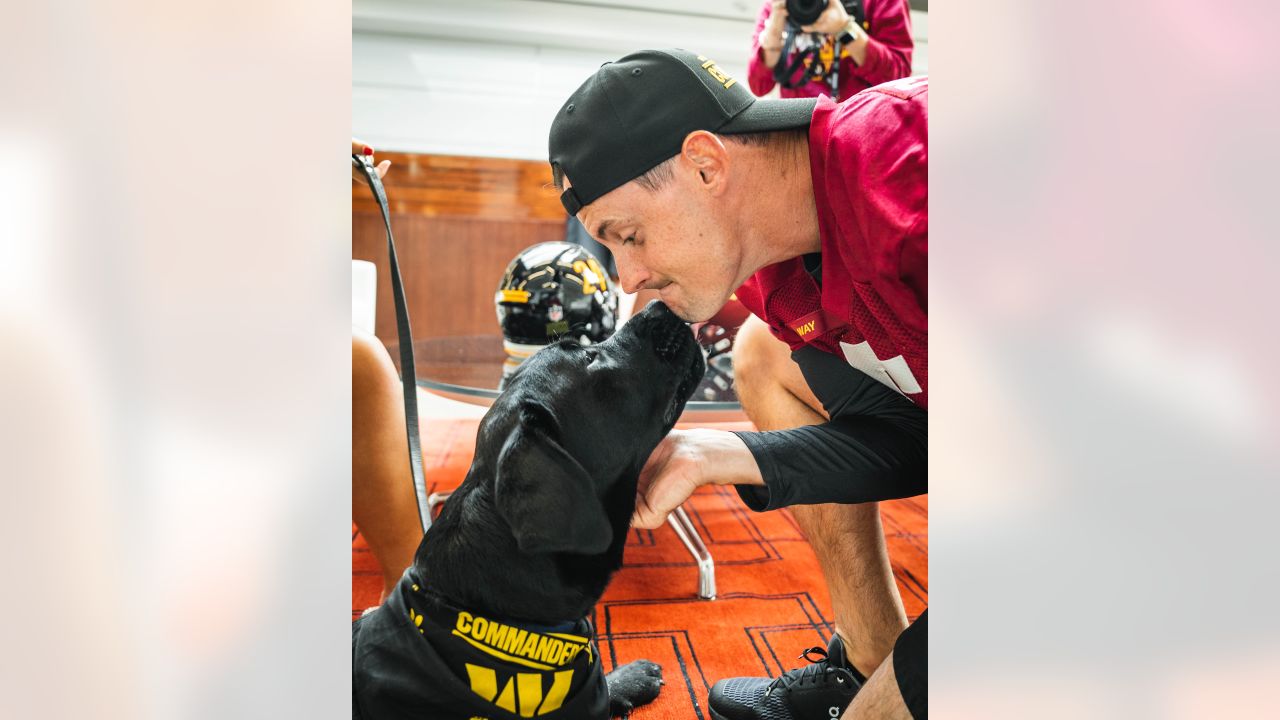 Commanders introduce new team valuable pup, Mando, at season opener 