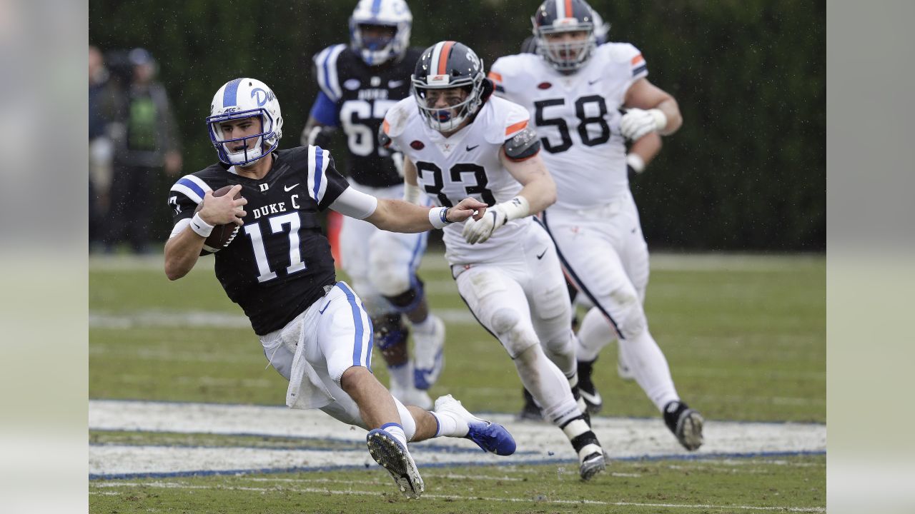 Duke quarterback Daniel Jones (17) runs against Virginia Tech