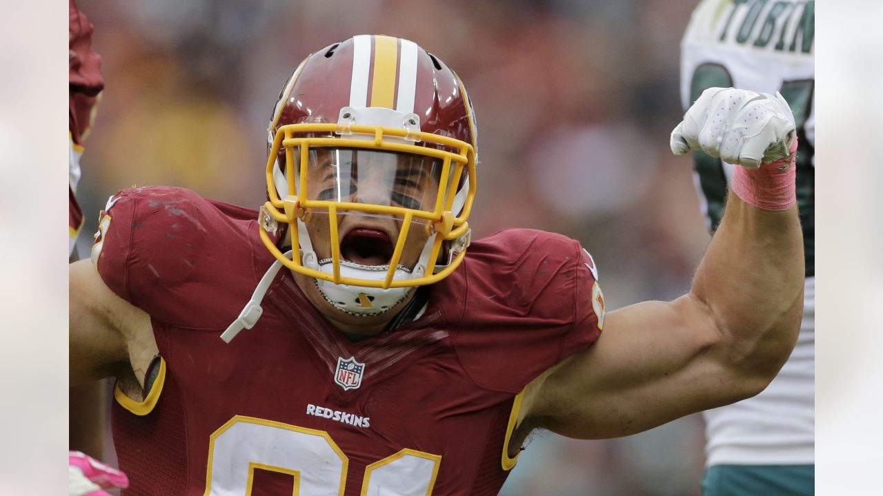 San Francisco 49ers tight end Jordan Reed wears a logo for Salute to Service,  the words It Takes All of Us and a 74 for former player Fred Dean before an  NFL