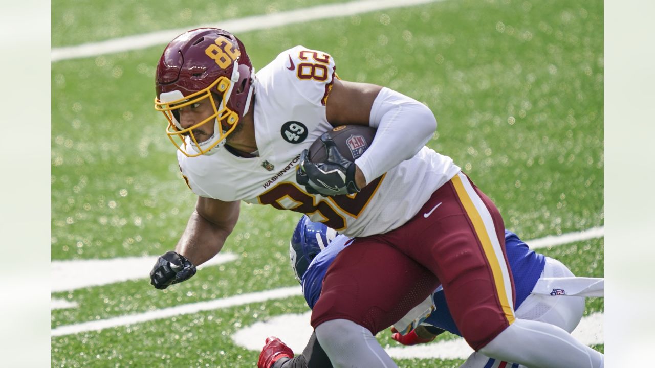 New York Giants inside linebacker Blake Martinez, left, intercepts