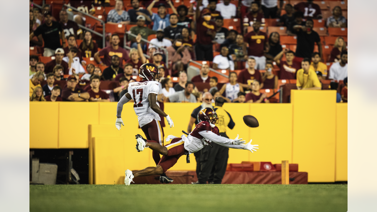 PHOTOS  Commanders practice under the lights at FedExField