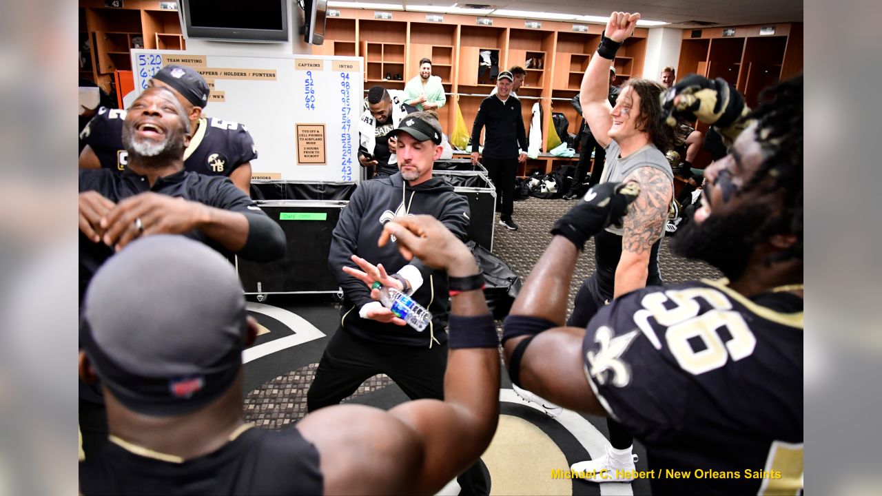 Weight of a city's hopes get best of Saints during locker room celebration