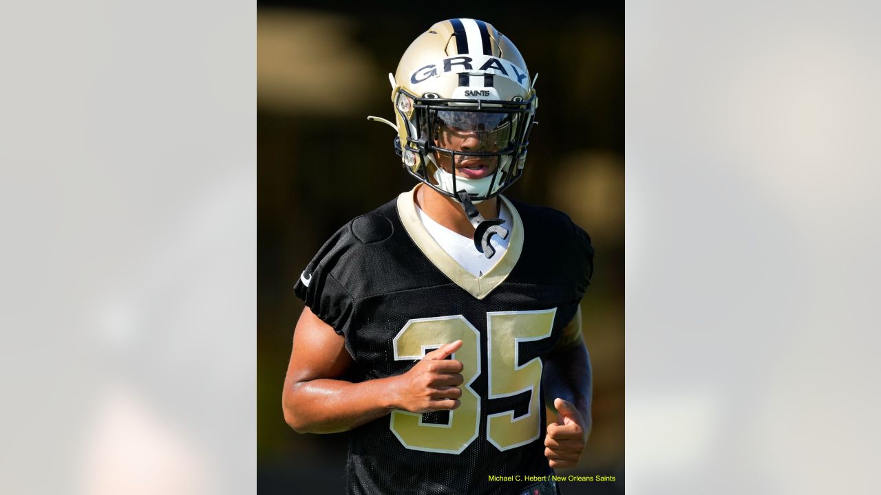 New Orleans Saints wide receiver Chris Olave (12) signs autographs, after  training camp at their NFL football training facility in Metairie, La.,  Saturday, July 30, 2022. (AP Photo/Gerald Herbert Stock Photo - Alamy