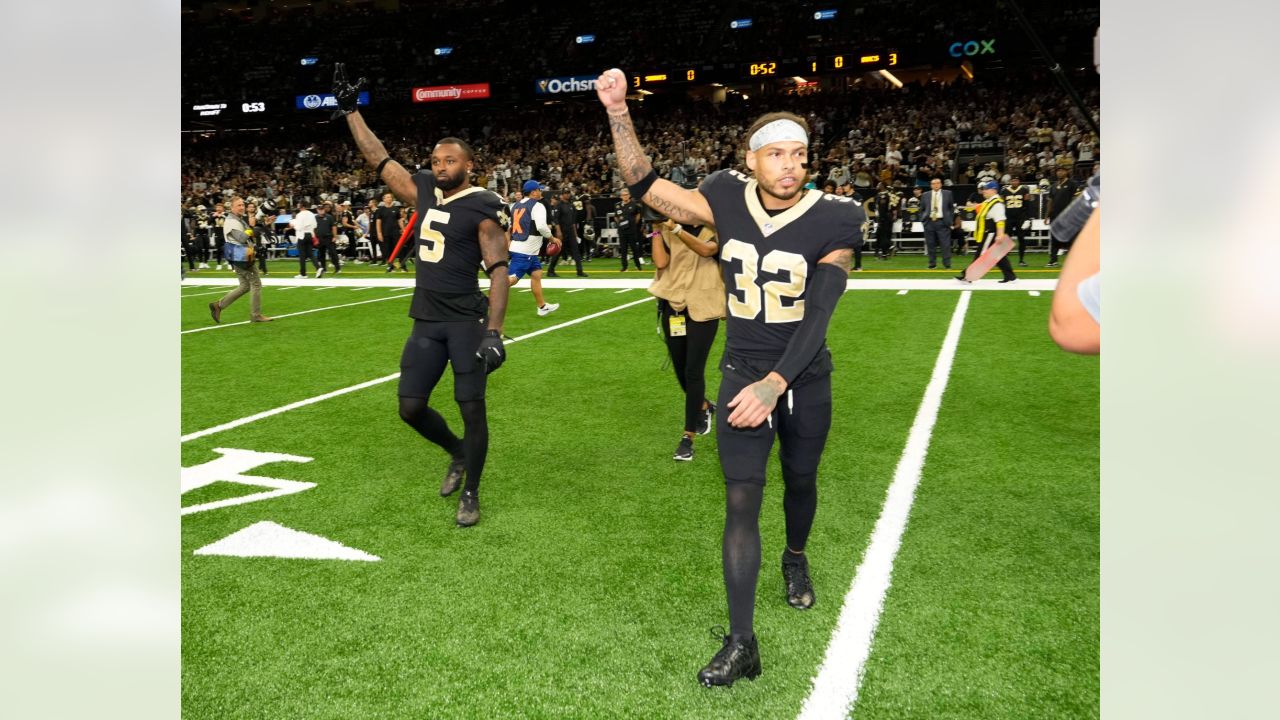 A general view of New Orleans Saints' players warming up ahead of