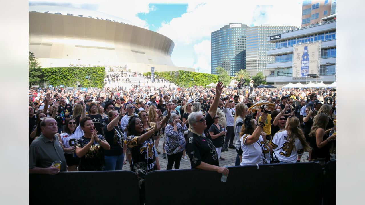 New Orleans Saints fans celebrate first game of season at Champions Square