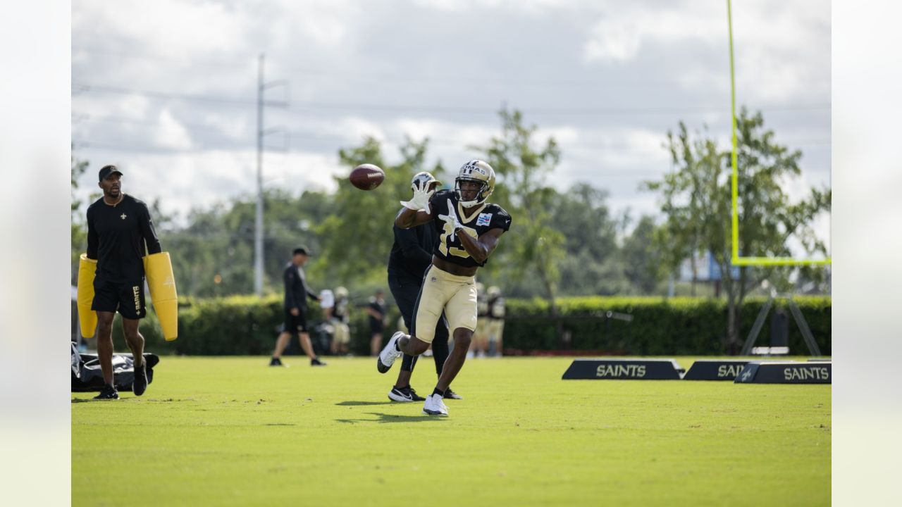 New Orleans Saints cornerback Alontae Taylor, left, tackles Tennessee  Titans wide receiver Nick Westbrook-Ikhine, right, after a catch in the  first half of an NFL football game in New Orleans, Sunday, Sept.