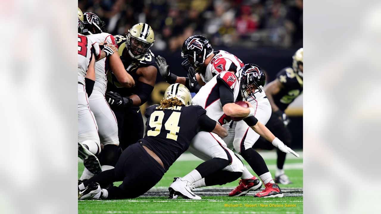 New Orleans Saints vs. Atlanta Falcons. Fans support on NFL Game.  Silhouette of supporters, big screen with two rivals in background Stock  Photo - Alamy