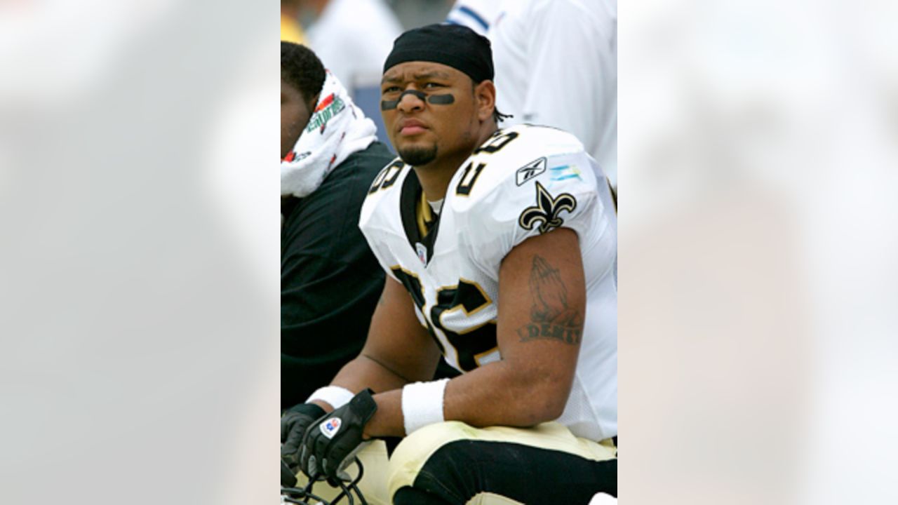 Former New Orleans Saints player Deuce McAllister visits with Gulfport  campers to promote hard work