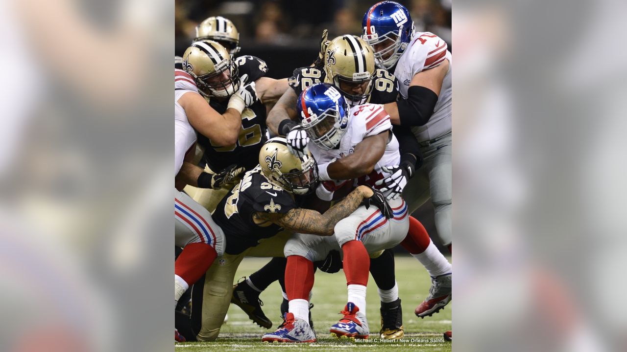 New Orleans Saints Drew Brees stretches on the sidelines before the game  against the New York Giants in week 4 of the NFL season at MetLife Stadium  in East Rutherford, New Jersey