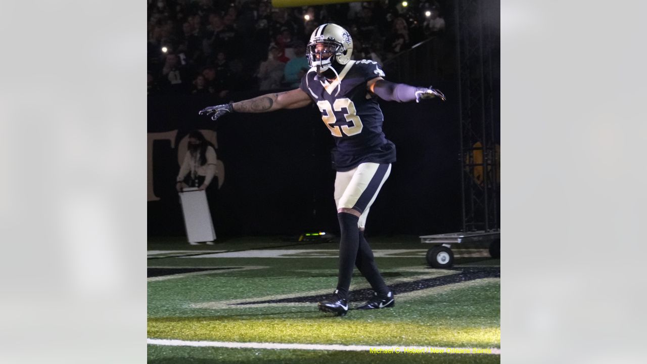 New Orleans Saints cornerback Marshon Lattimore (23) runs back an