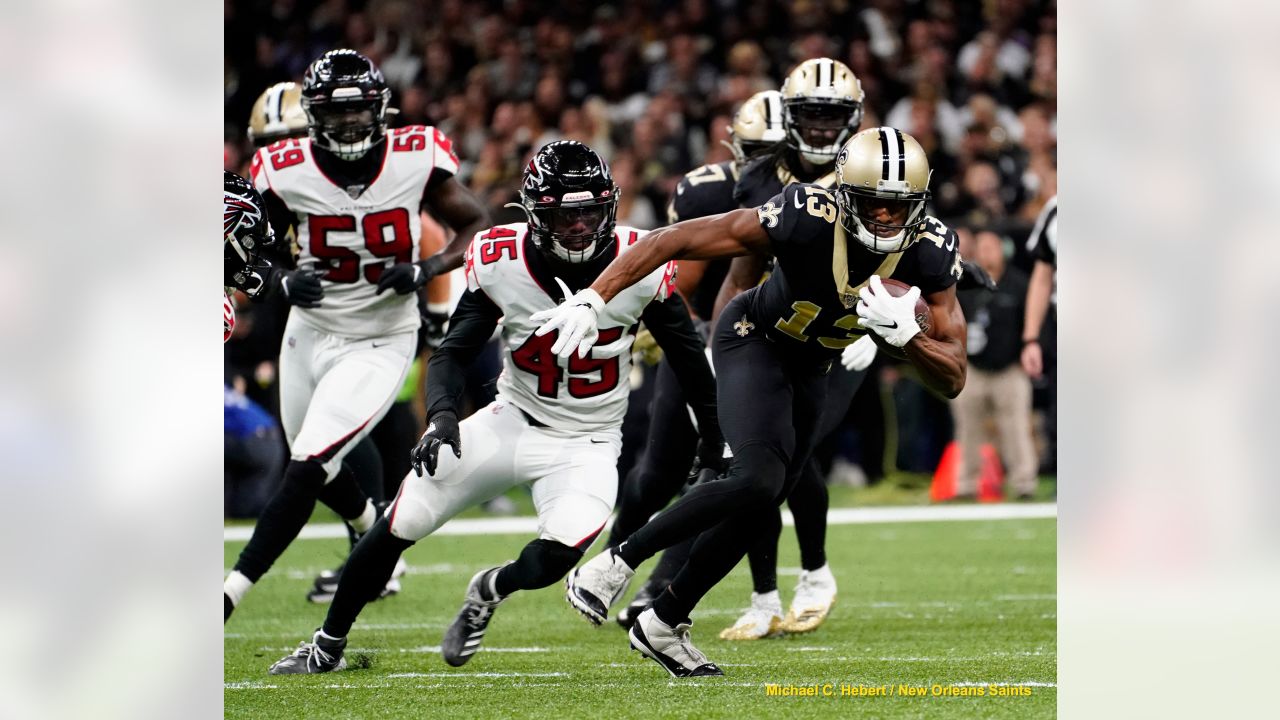 New Orleans Saints vs. Atlanta Falcons . NFL Game. American Football League  match. Silhouette of professional player celebrate touch down. Screen in b  Stock Photo - Alamy