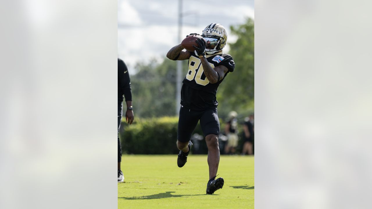 New Orleans Saints cornerback Alontae Taylor, left, tackles Tennessee  Titans wide receiver Nick Westbrook-Ikhine, right, after a catch in the  first half of an NFL football game in New Orleans, Sunday, Sept.