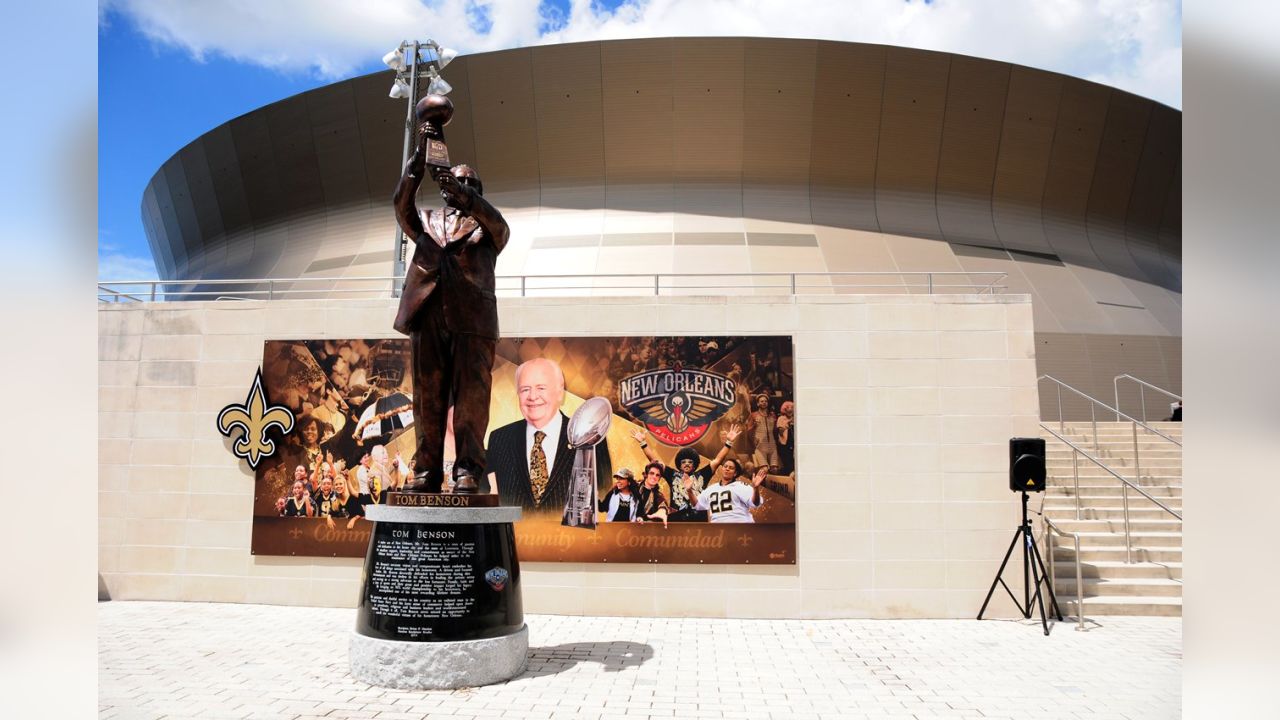 Tom Benson now has a stadium named after him, with a statue