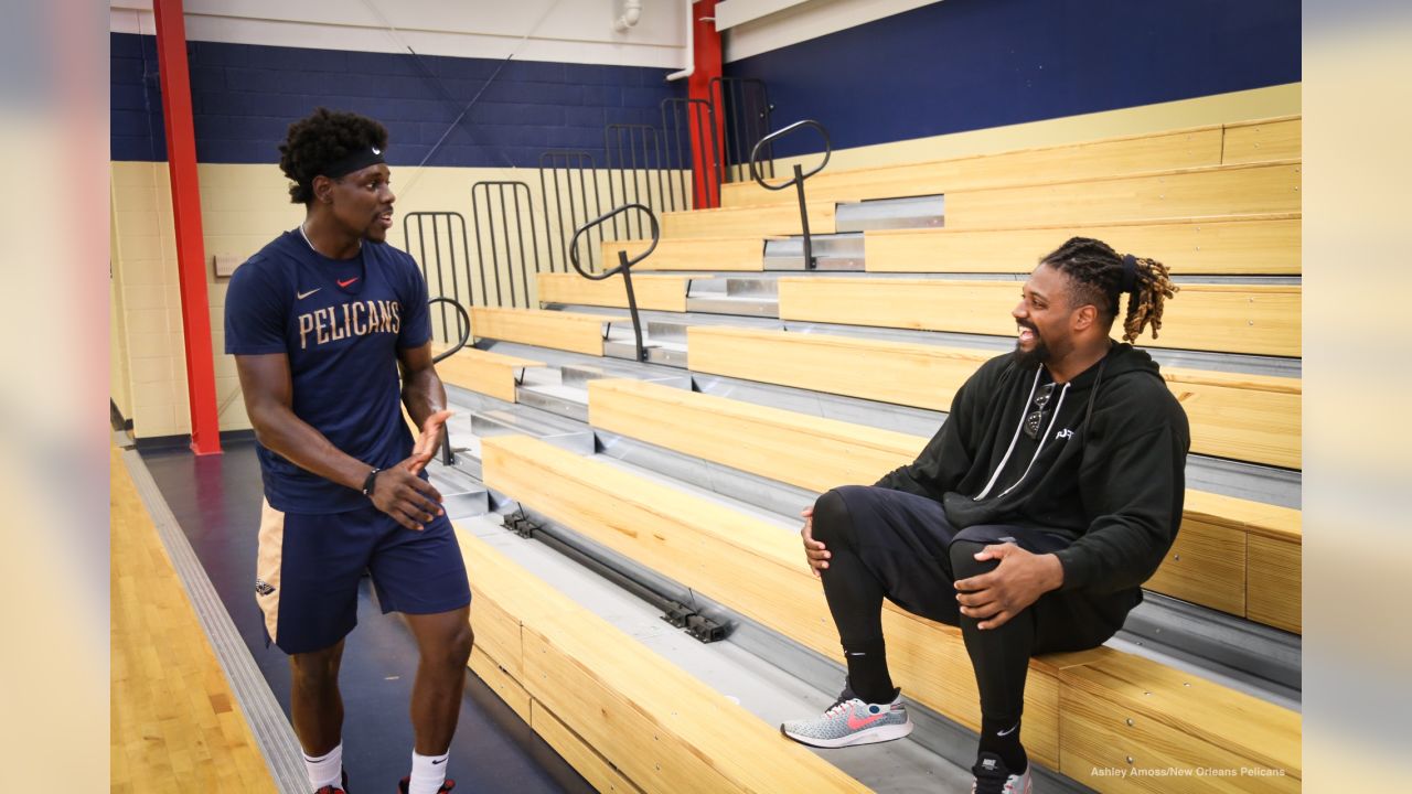 New Orleans Pelicans - Cam Jordan stopped by practice today and Jrue  Holiday hooked him up with a jersey! #NOLA