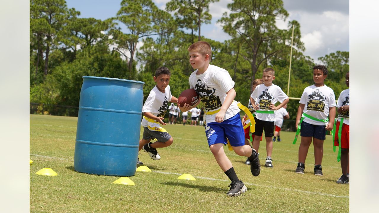 Photos: Marcus Maye hosts free youth football camp