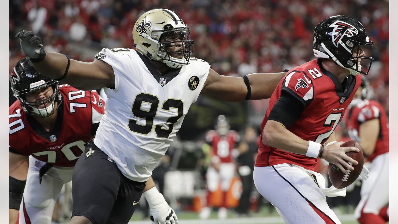 New Orleans Saints vs. Atlanta Falcons. Fans support on NFL Game.  Silhouette of supporters, big screen with two rivals in background Stock  Photo - Alamy