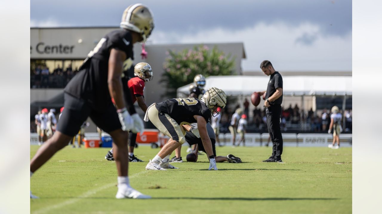 New Orleans Saints rookie cornerback Alontae Taylor taking hands