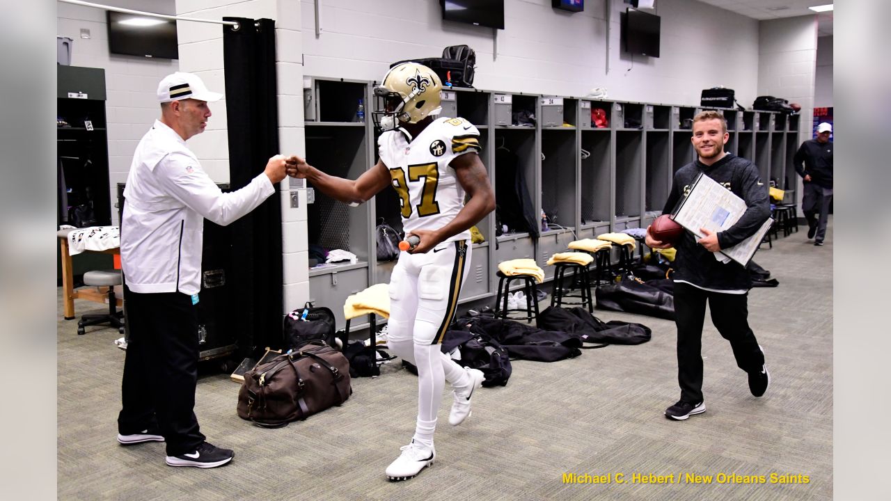 Weight of a city's hopes get best of Saints during locker room celebration