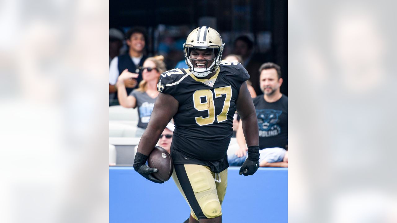 New Orleans Saints defensive end Malcolm Roach (97) reacts after