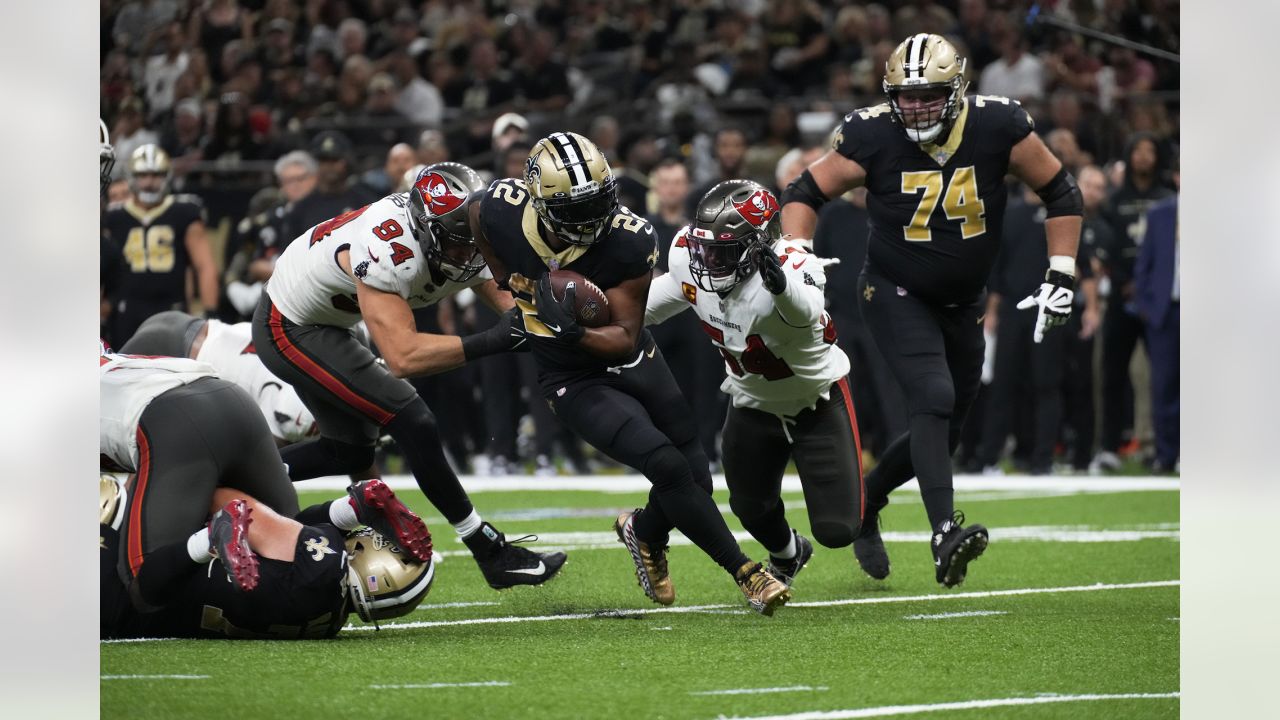 New Orleans Saints running back Mark Ingram (22) is tackled by