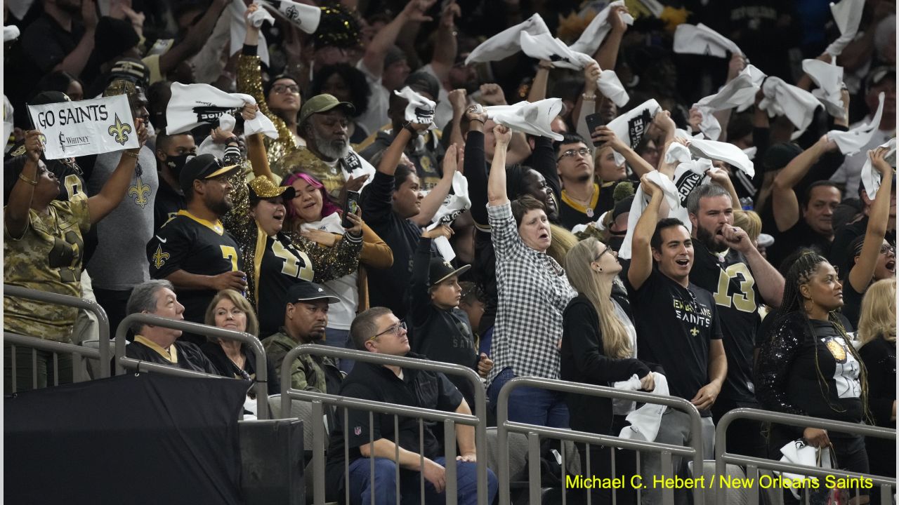 New Orleans Saints vs. Atlanta Falcons. Fans support on NFL Game.  Silhouette of supporters, big screen with two rivals in background Stock  Photo - Alamy