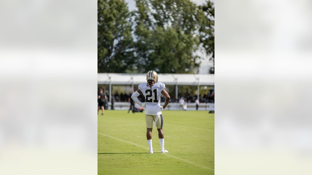 New Orleans Saints cornerback Alontae Taylor, left, tackles Tennessee  Titans wide receiver Nick Westbrook-Ikhine, right, after a catch in the  first half of an NFL football game in New Orleans, Sunday, Sept.