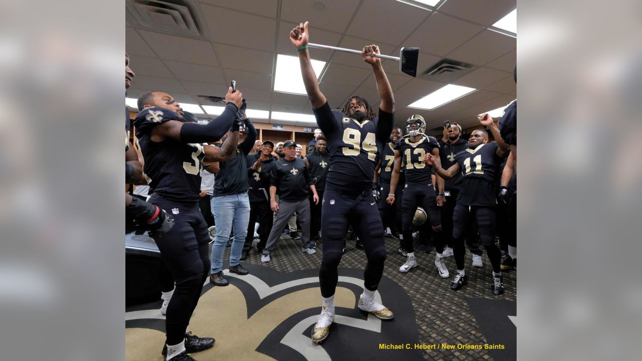 Weight of a city's hopes get best of Saints during locker room celebration