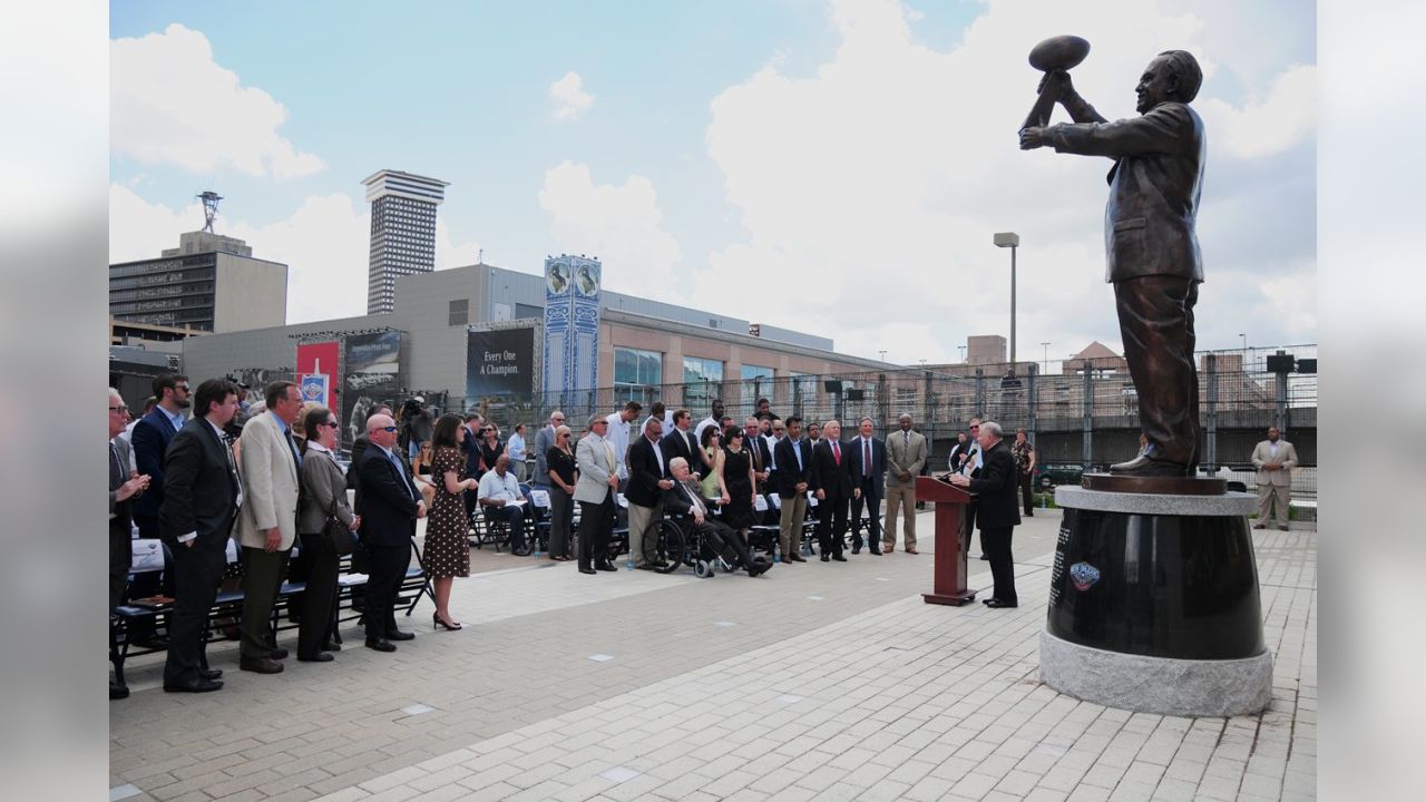 Saints unveil statue of Tom Benson at Superdome