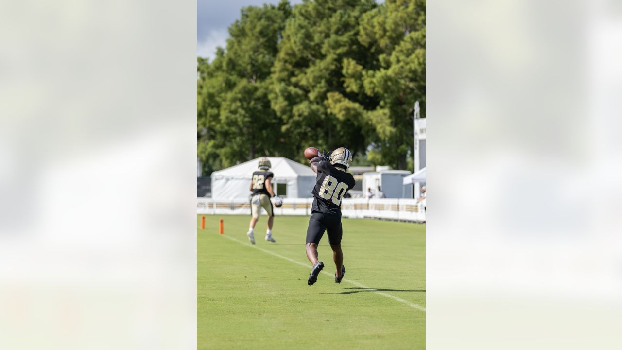 New Orleans Saints rookie cornerback Alontae Taylor taking hands