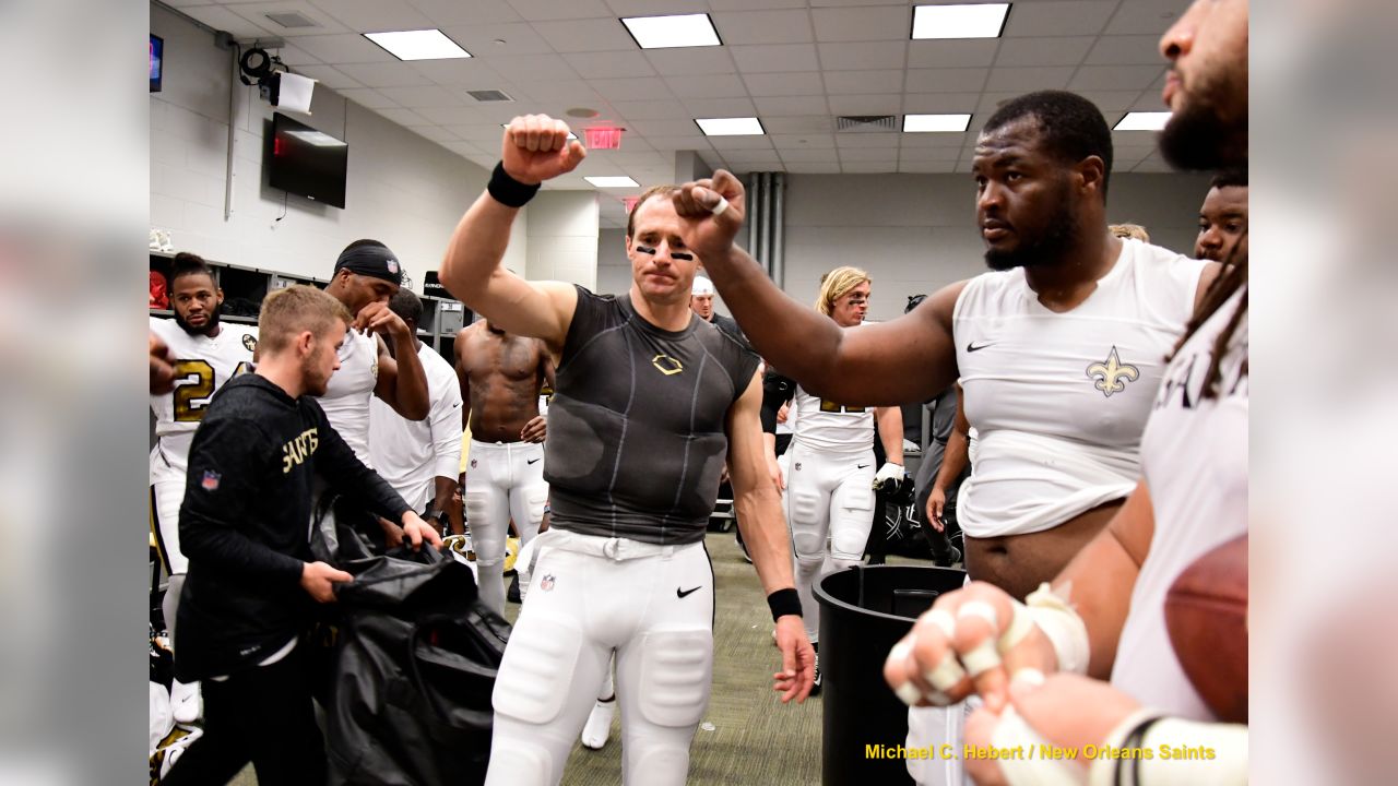 Weight of a city's hopes get best of Saints during locker room celebration