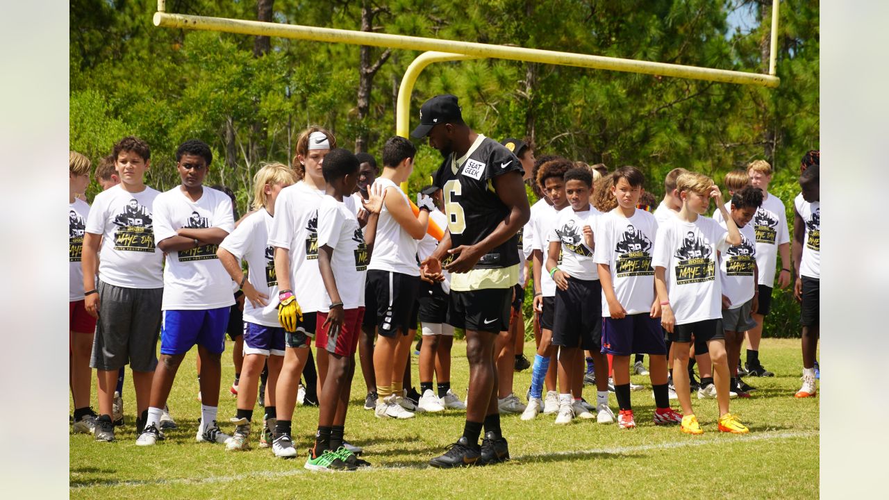 Photos: Marcus Maye hosts free youth football camp