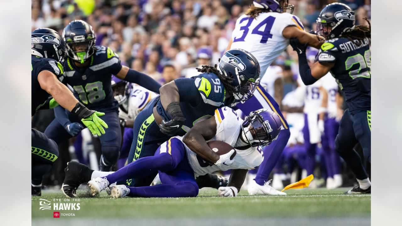 Seattle Seahawks defensive tackle Myles Adams (95) walks off the