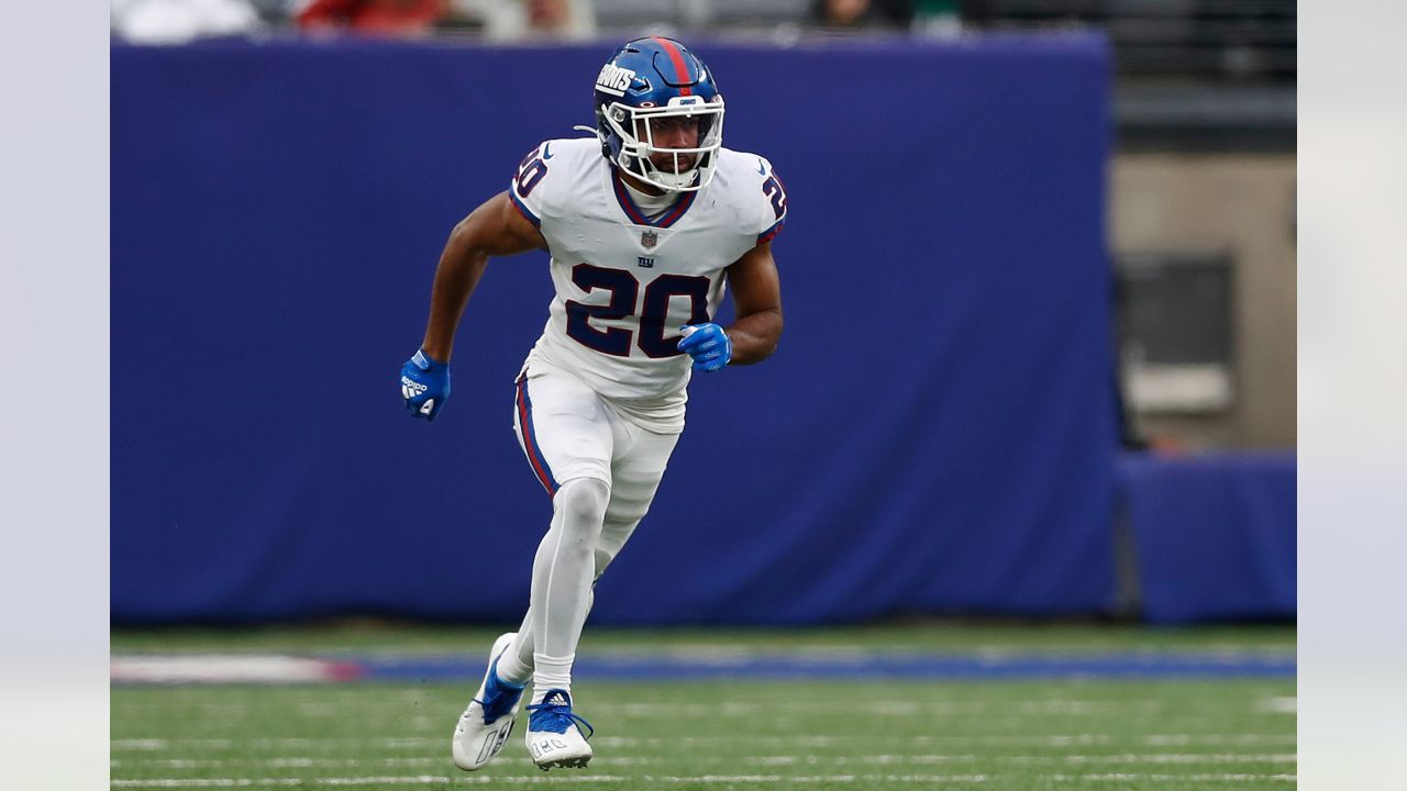 New York Giants safety Julian Love (20) wears decals of the