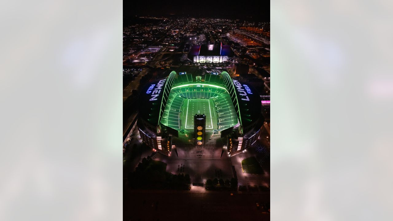 PHOTOS: Lumen Field Lit In Action Green In Advance Of Monday Night Football