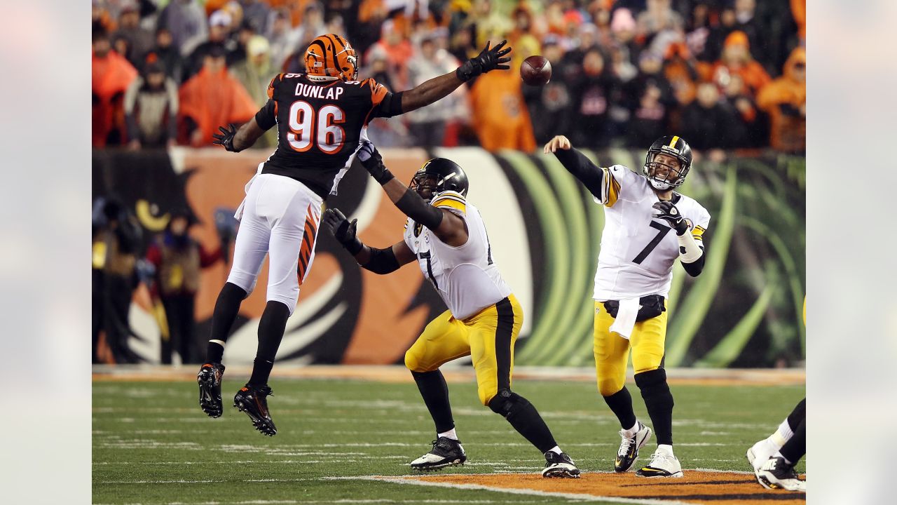 Pittsburgh Steelers quarterback Ben Roethlisberger (7) is sacked by  Cincinnati Bengals' A.J. Hawk (50) during the second half of play in their  NFL Wild Card Round game at Paul Brown Stadium in