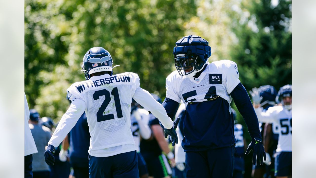 Seattle Seahawks linebacker Levi Bell (98), linebacker Boye Mafe (53), and  safety Jerrick Reed II (32) celebrate during an NFL pre-season football  game against the Minnesota Vikings, Thursday, Aug. 10, 2023 in