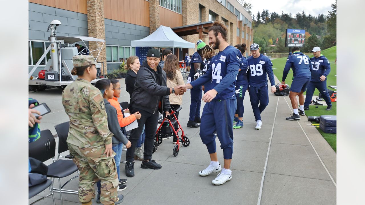 The Sea Gals cheerleades wear combat boots in honor of veterns before the  Seattle Seahawks against the New York Giants NFL football game, Sunday,  Nov. 7, 2010, in Seattle. (AP Photo/Ted S.