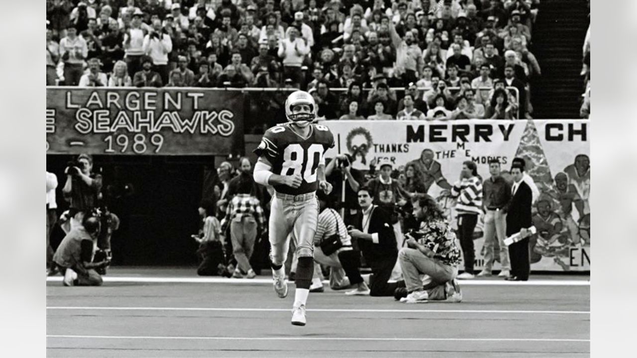 Wide Receiver Steve Largent of the Seattle Seahawks runs with the