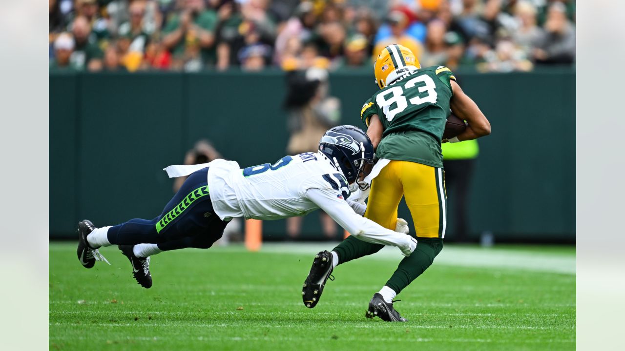 Seattle Seahawks defensive end Dre'Mont Jones (55) spikes the ball after a  teammate scored a touchdown during an NFL preseason game against the Green  Bay Packers Saturday, Aug. 26, 2023, in Green