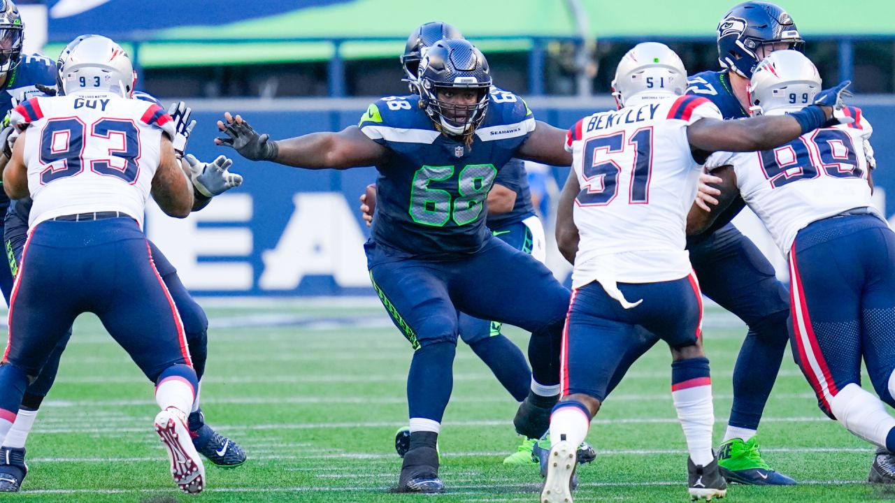 Seattle Seahawks guard Damien Lewis (68) gets set during an NFL football  game against the Carolina