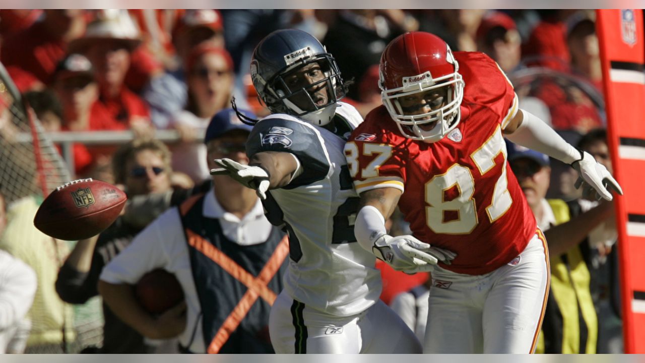 Seattle Seahawks - Seahawks quarterback Rick Mirer attempts to elude  Derrick Thomas during an NFL Football game against the Kansas City Chiefs  on January 2, 1994 in Kansas City, Missouri.