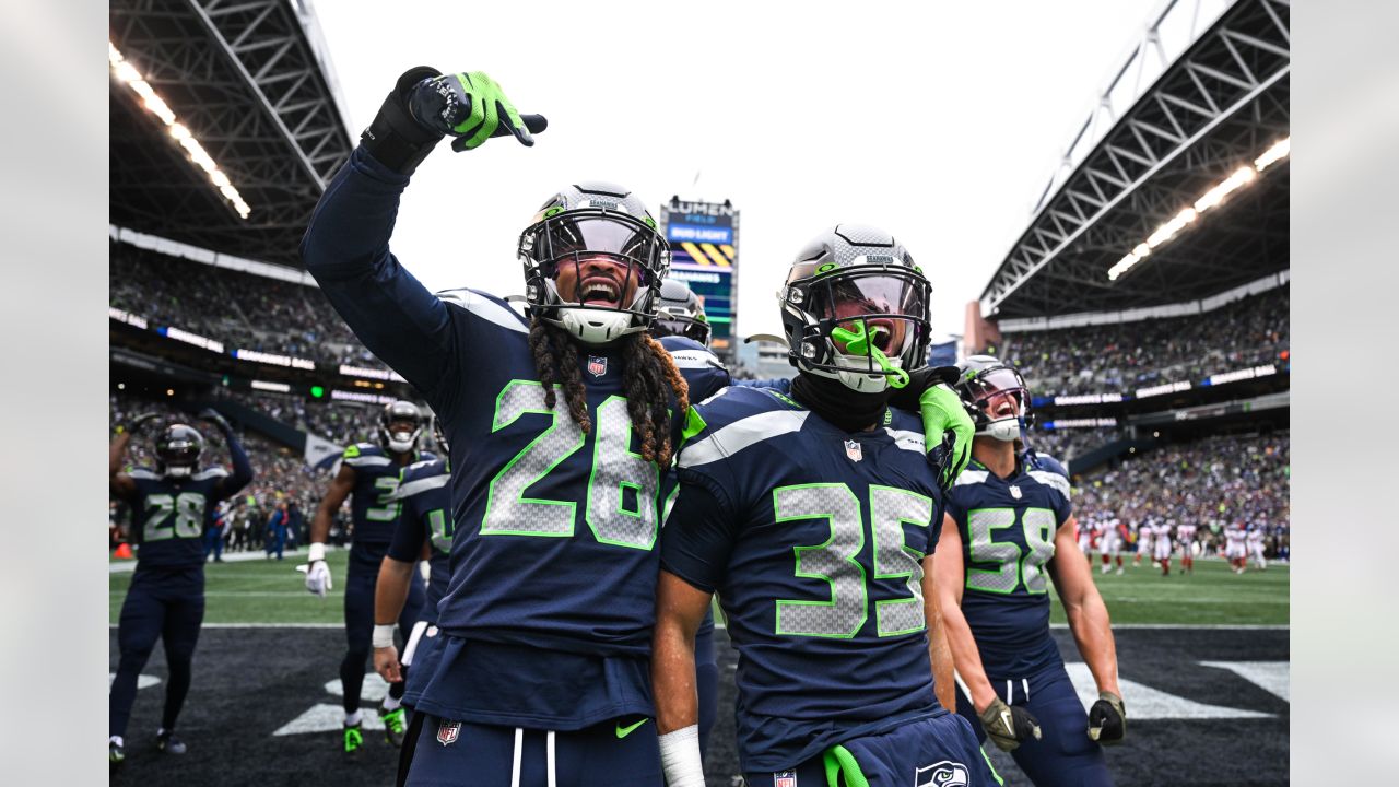 Seattle Seahawks safety Ryan Neal (26) poses for photos with FC Bayern  Munich players on Friday, Nov. 11, 2022 in Munich, Germany. (Gary  McCullough/AP Images for NFL Stock Photo - Alamy