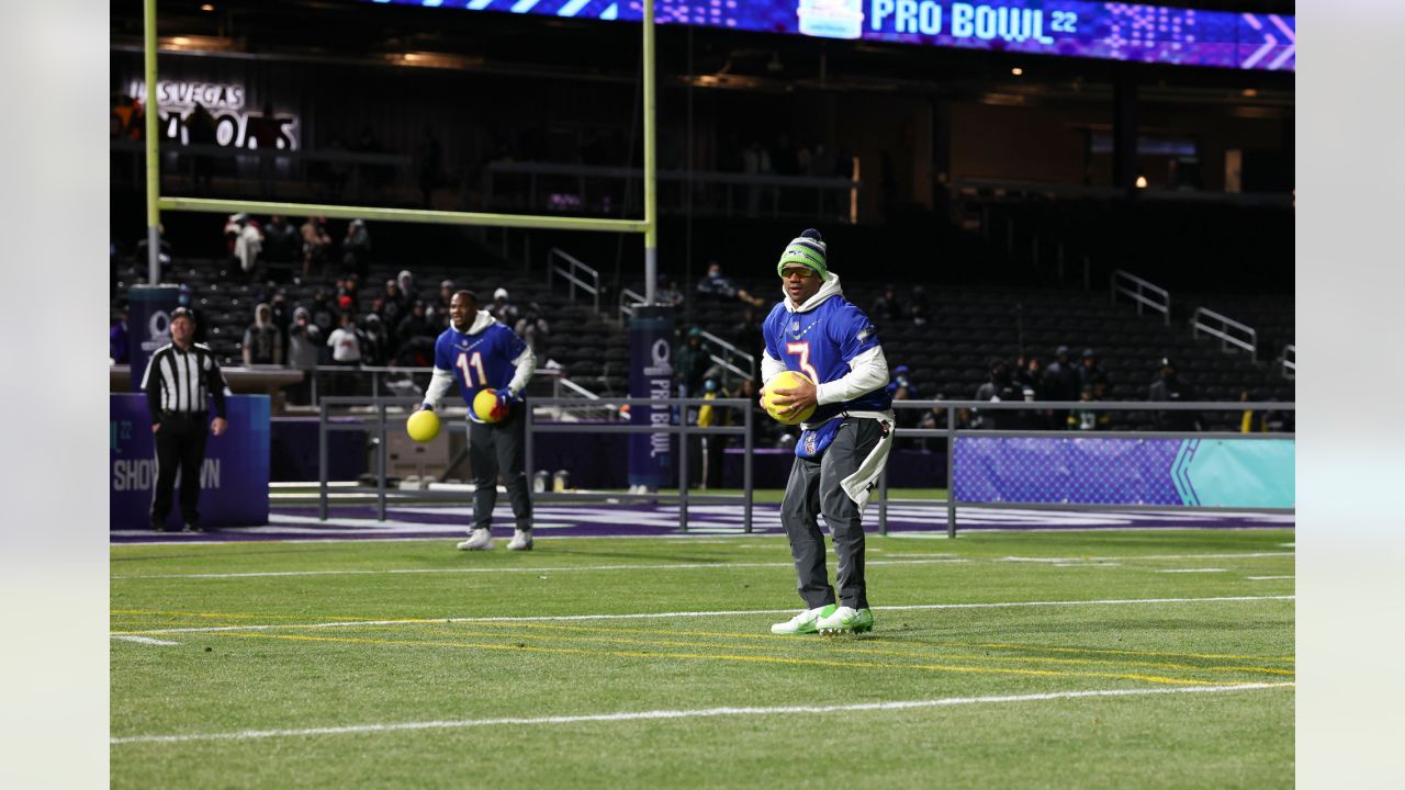 NFC cornerback Trevon Diggs of the Dallas Cowboys celebrates with Seattle  Seahawks Russell Wilson after competing in the Best Catch event at the 2022  Pro Bowl Skills Showdown Wednesday, February 2, 2022