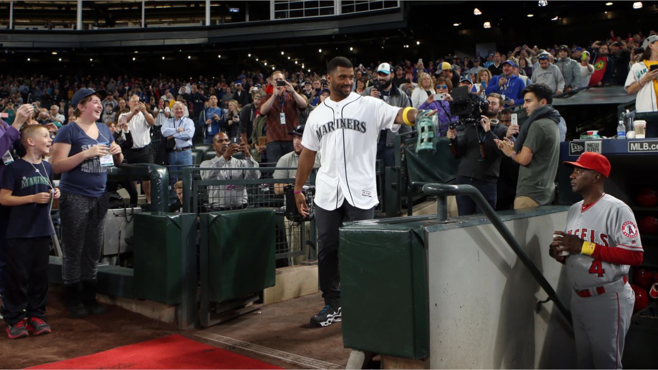 Yankees Minor Leaguer Russell Wilson threw out the ceremonial first pitch  at the Mariners game