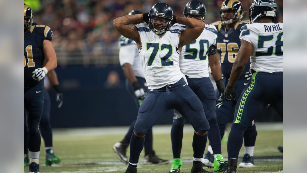 Michael Bennett tutors Seahawks defense Zach Charbonnet back