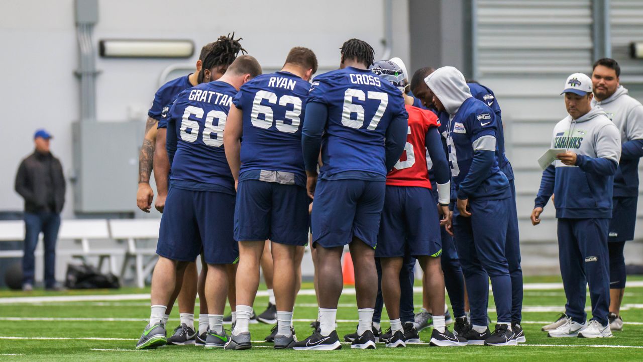 Seattle Seahawks tackle Charles Cross (67) warms up before playing against  the Los Angeles Rams in