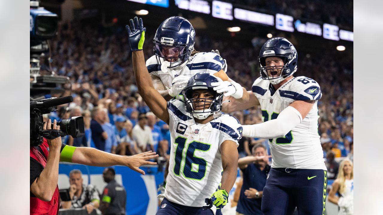 Seattle Seahawks wide receiver Jaxon Smith-Njigba (11) stands with  teammates including tight end Will Dissly (89) and tight end Colby  Parkinson (84) May 22, 2023, at the team's NFL football training facility