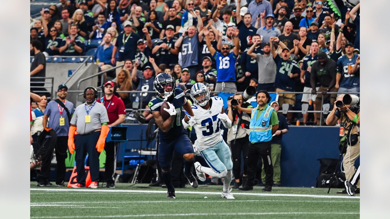 A fan waves a Dallas Cowboys flag before a preseason NFL football game  between the Seattle Seahawks and the Cowboys, Saturday, Aug. 19, 2023, in  Seattle. (AP Photo/Lindsey Wasson Stock Photo - Alamy