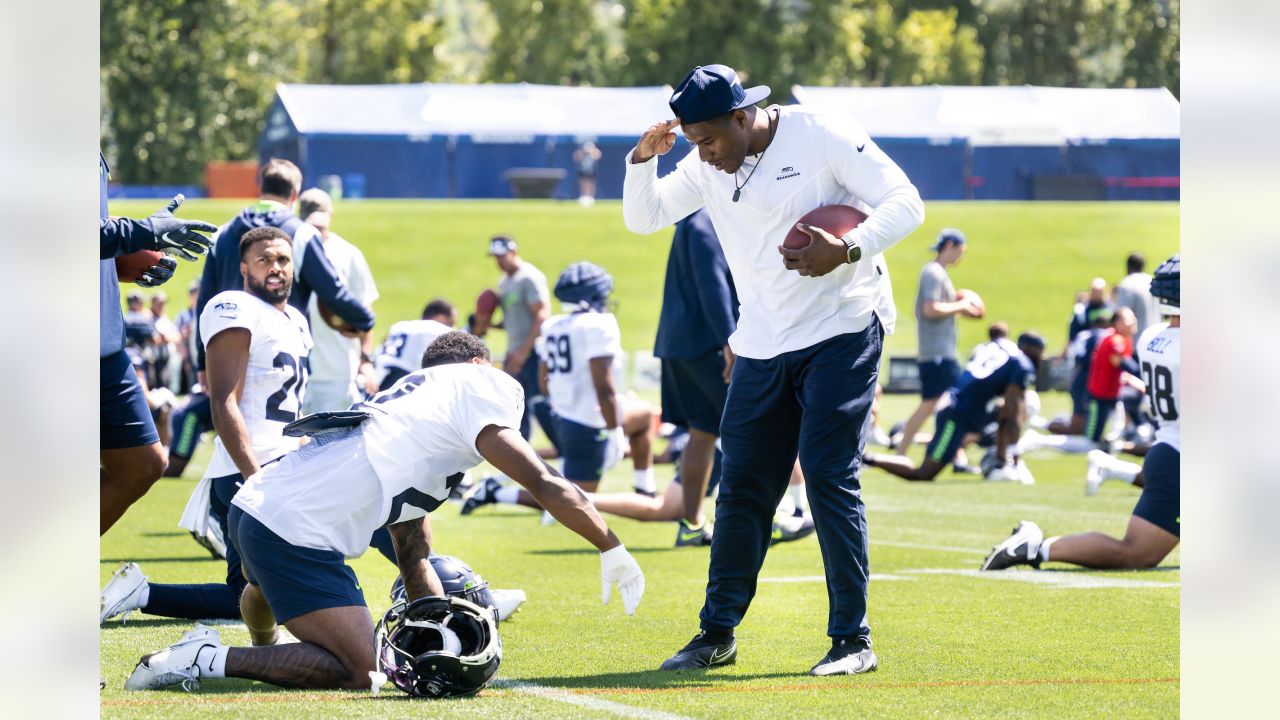 Seattle Seahawks - Lock taking time to meet with our military at practice  yesterday. Salute to service moment presented by USAA #SaluteToService